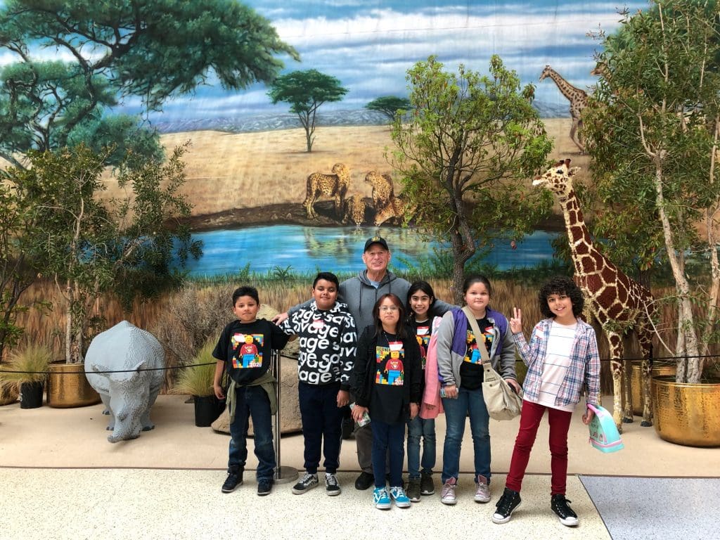 group of kids at the zoo