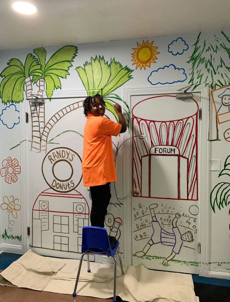 WBC Gallery. Child drawing a mural